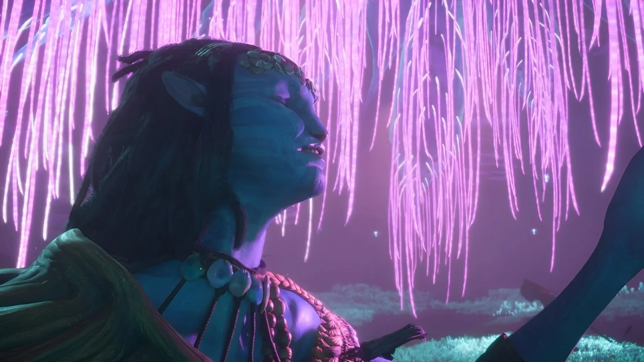 This image depicts a Na'vi character with intricate facial markings, immersed in a serene, bioluminescent environment. The character is gazing upward with a peaceful expression, surrounded by glowing, hanging tendrils of light that resemble ethereal plants or roots. The background is filled with soft, vibrant purples and pinks, creating a mystical and otherworldly ambiance. The figure is adorned with natural jewelry, such as stones or shells, and has long, dark hair. The scene conveys a sense of harmony and connection with nature.